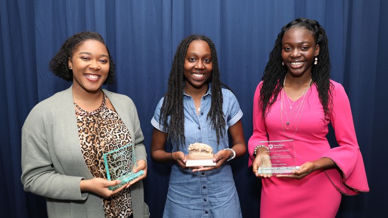 Penn State Brandywine students accept awards. 