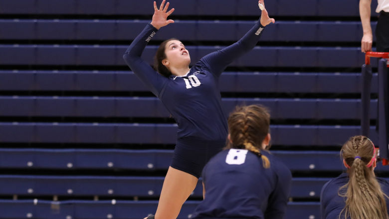 Nikki Poissant swings for a point at the PSUAC Championship
