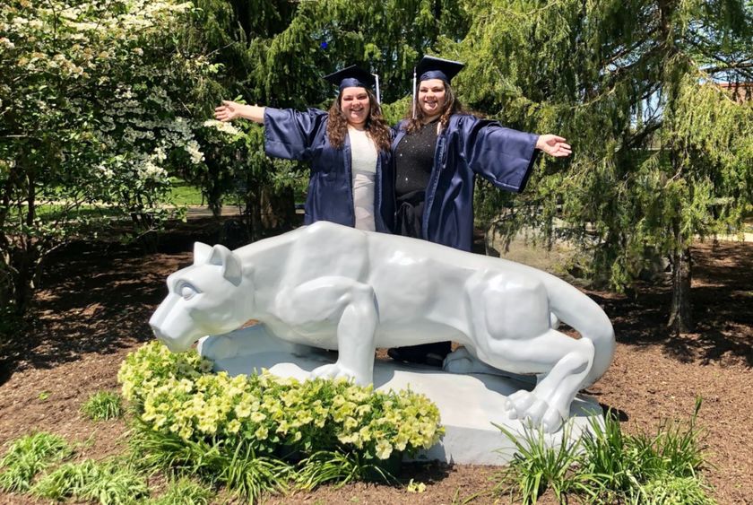 Twin sisters Chloe and Claudia Przybylski at the Penn State Brandywine Lion Shrine.