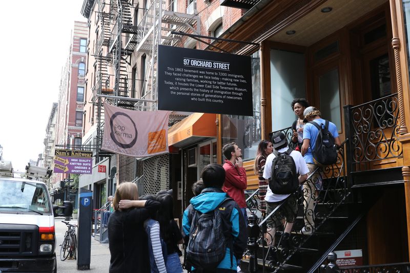 Studetns touring the Tenement Museum