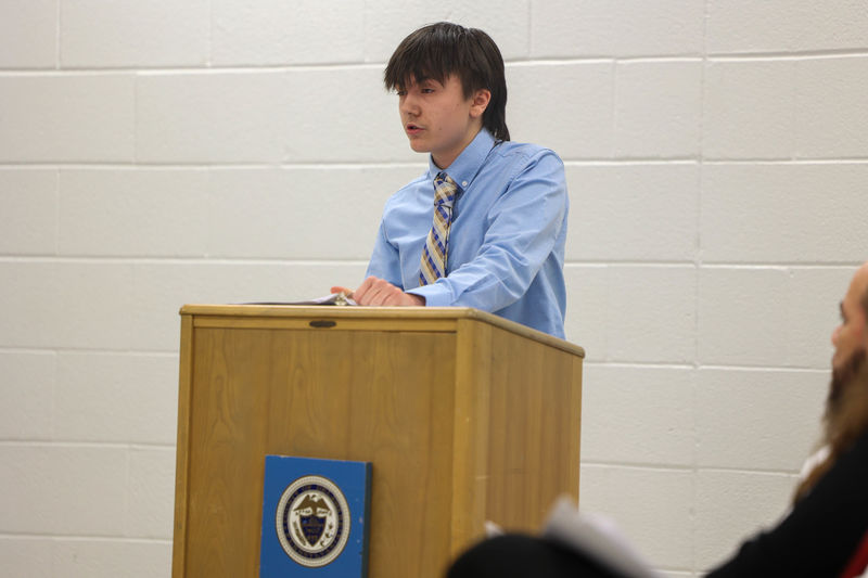 Ryan speaking at podium