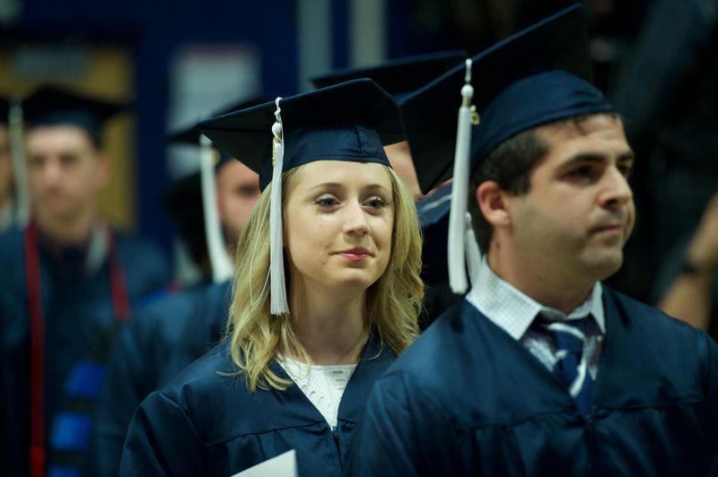 Photo of student graduating.