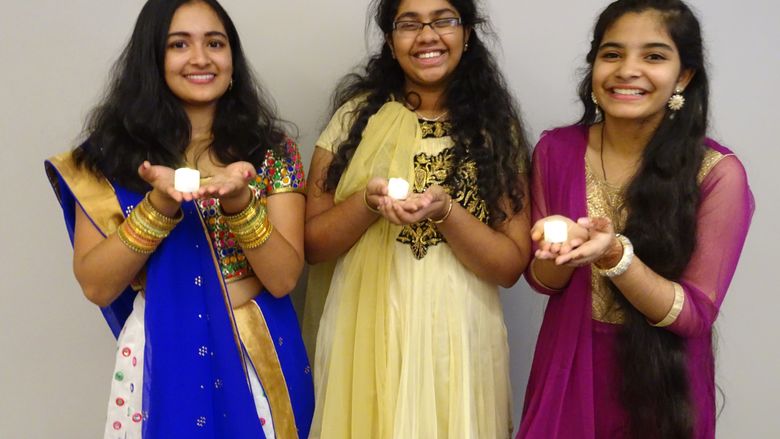 Penn State Brandywine students wore traditional dresses for the campus Diwali celebration.